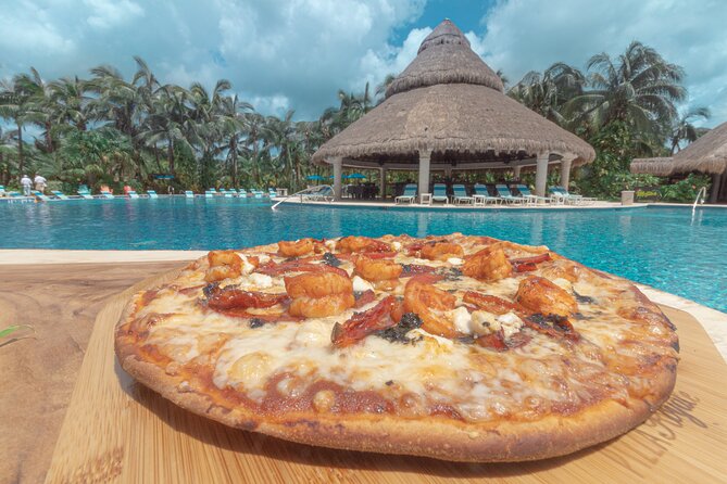 Cozumel: Paradise Beach Club All-Inclusive Day Pass - Extras with extra charges: water toys, banana boats, and the fine print