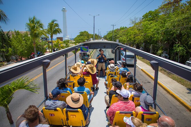 Open Top City Tour & Beach Break - Benito Juarez Park Walk: Churches, a Clock Tower, and Quick Shopping