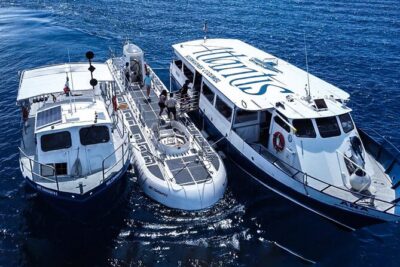 Submarine Atlantis Cozumel Adventure by Day & Sunset - Stop 1: Atlantis check-in, lounge video, and the boat transfer
